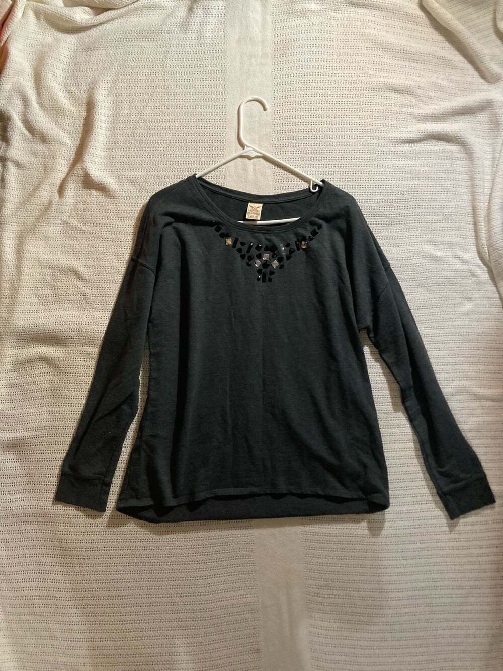 Black V-neck 3/4 sleeve cotton top with rhinestone neckline
